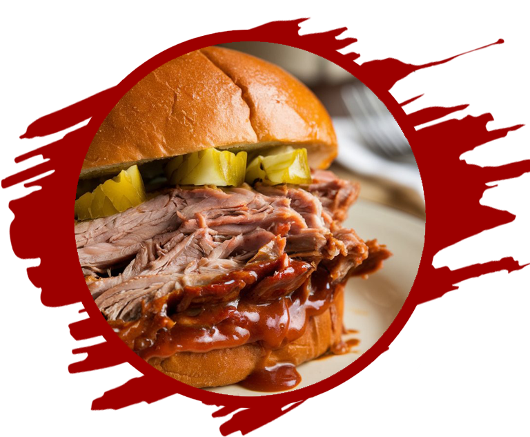 An image of a BBQ Pork Sandwich topped with pickles